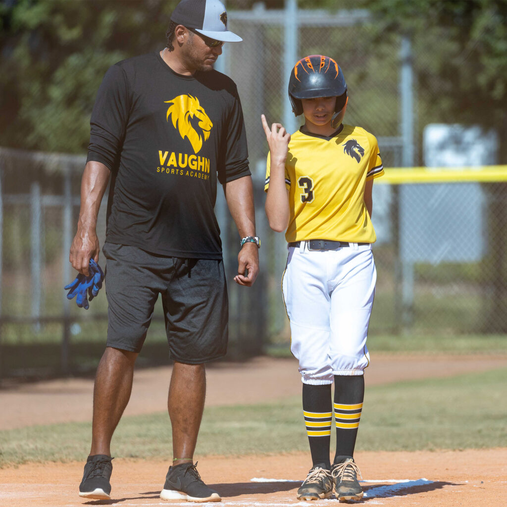 coach talking with a kid