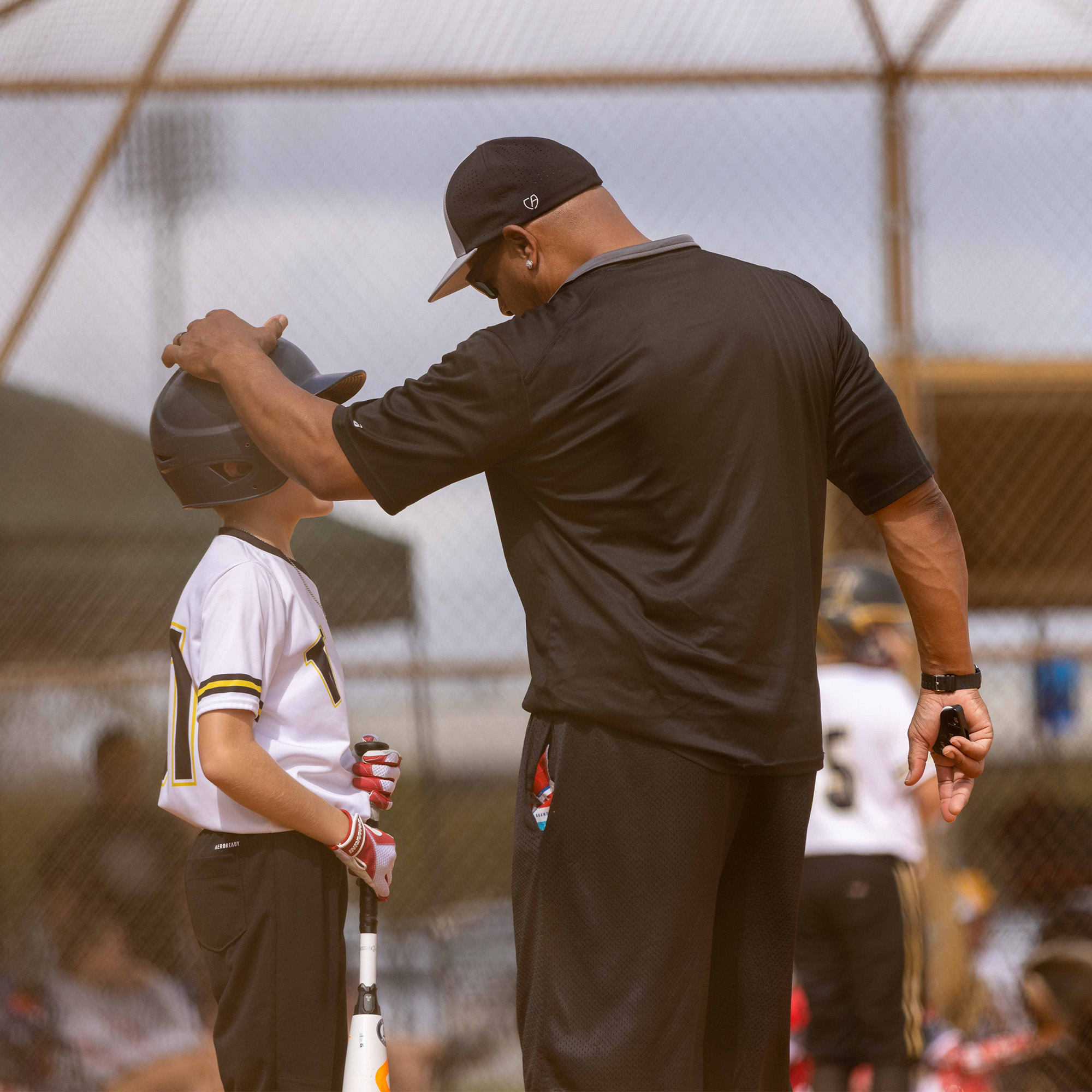coach talking with a kid